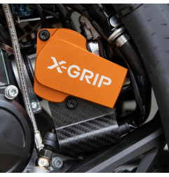 X-GRIP OSŁONA TBI (TBI-PROTECTOR) KTM SX/EXC '23-, HUSQVARNA TC/ TE '24-, GASGAS EC/MC '24-, KOLOR POMARAŃCZOWY